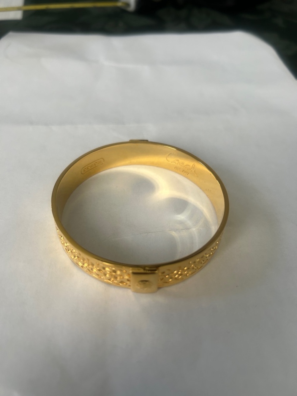 Coach signature gold tone bangle bracelet. Like new